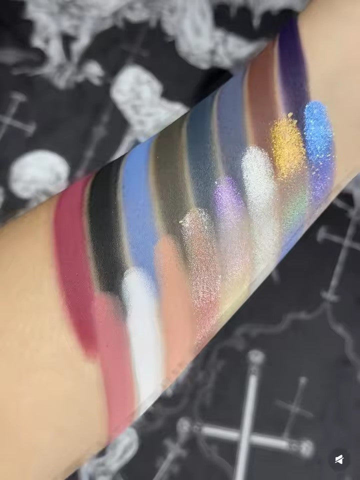 A 16-color eyeshadow palette, including glitter, matte, pearl, and star-shaped shadows