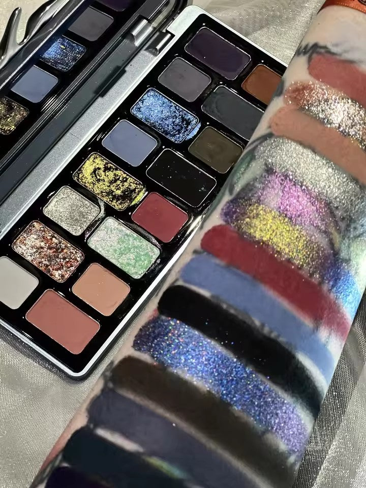 A 16-color eyeshadow palette, including glitter, matte, pearl, and star-shaped shadows