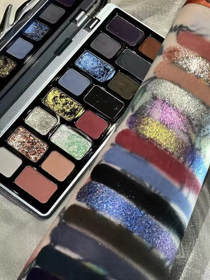 A 16-color eyeshadow palette, including glitter, matte, pearl, and star-shaped shadows
