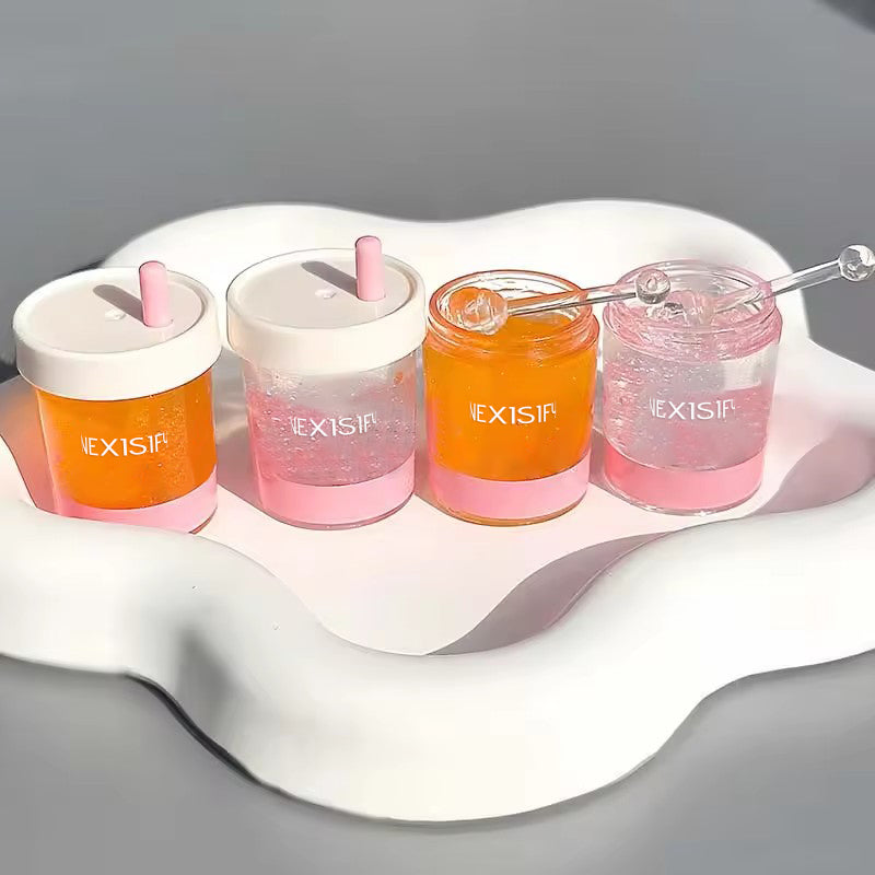 Gel-based blush with an applicator stick, shimmering orange color with a natural sheen