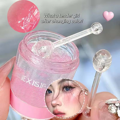 Gel-based blush with an applicator stick, shimmering orange color with a natural sheen